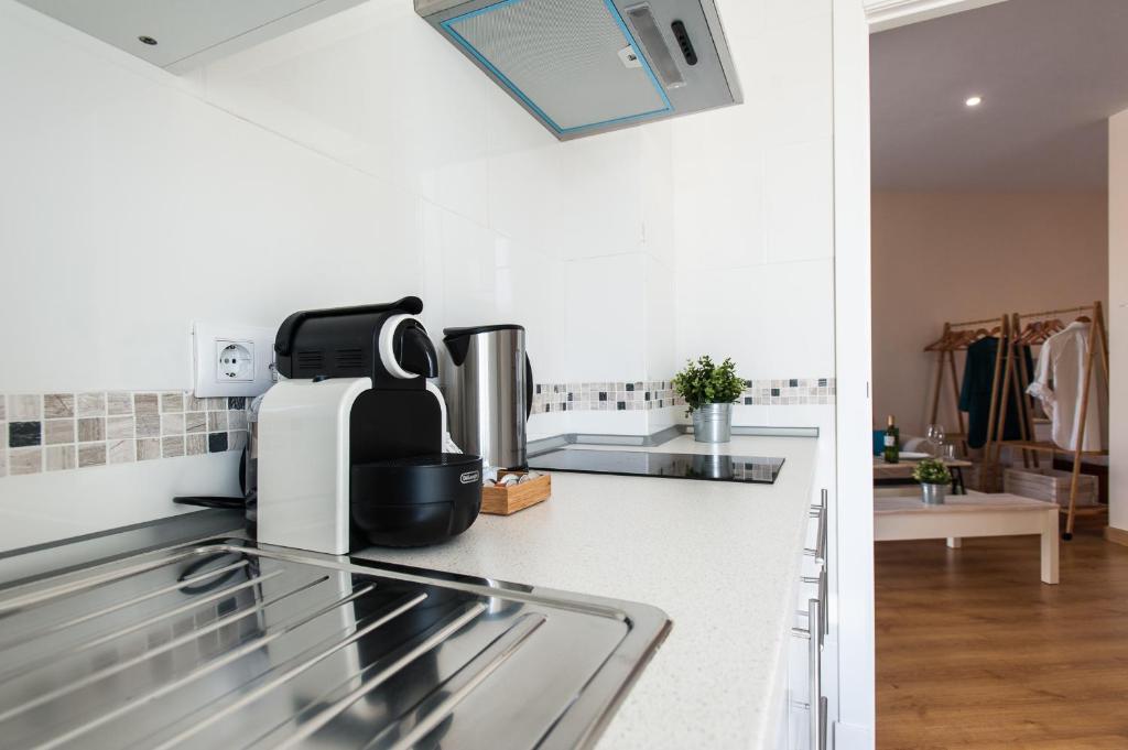 Kuchnia lub aneks kuchenny w obiekcie Hommyhome Pozo Santo Penthouse