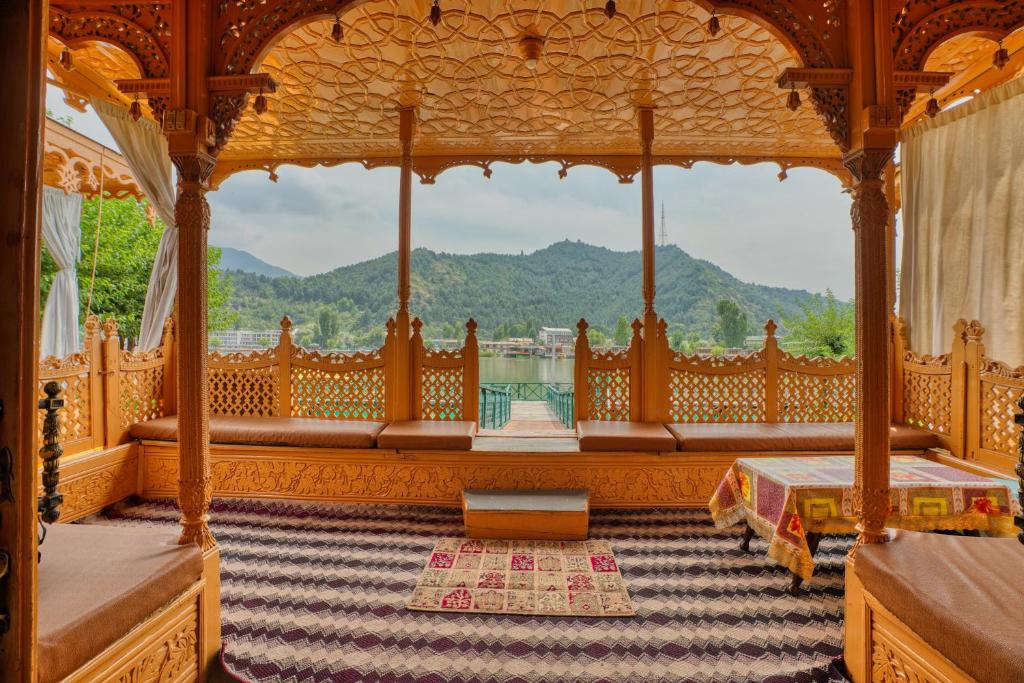 a room with a gazebo with a view at Alexandra Houseboats in Srinagar