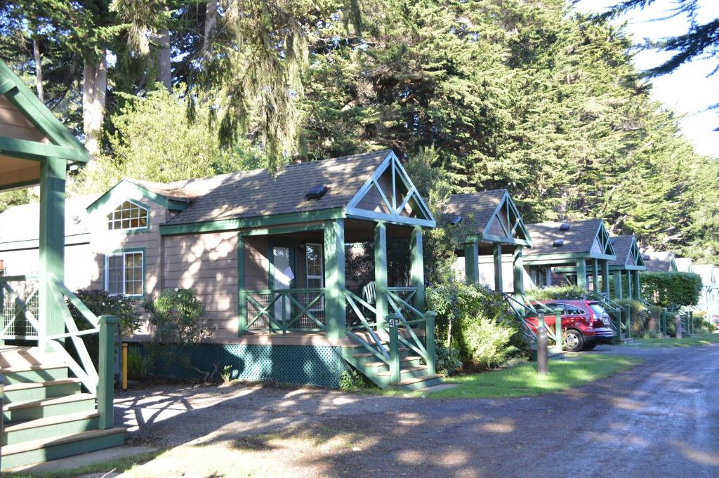 a house with a gazebo on the side of a street at Lighthouse Pointe Resort in Point Arena