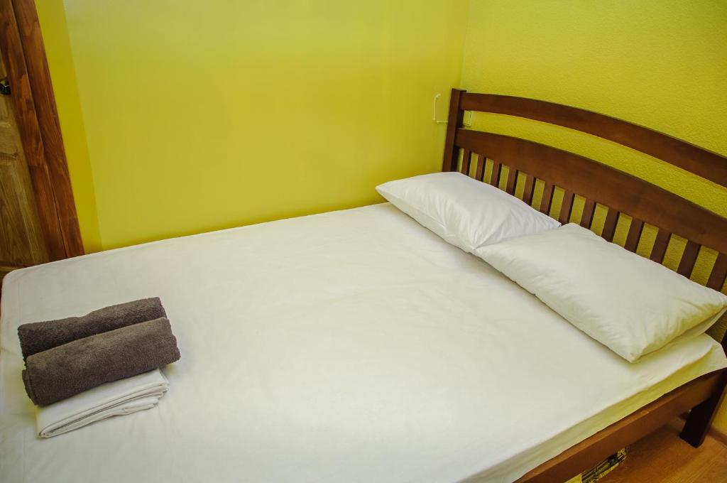 Postel nebo postele na pokoji v ubytování Golden Globus Hostel