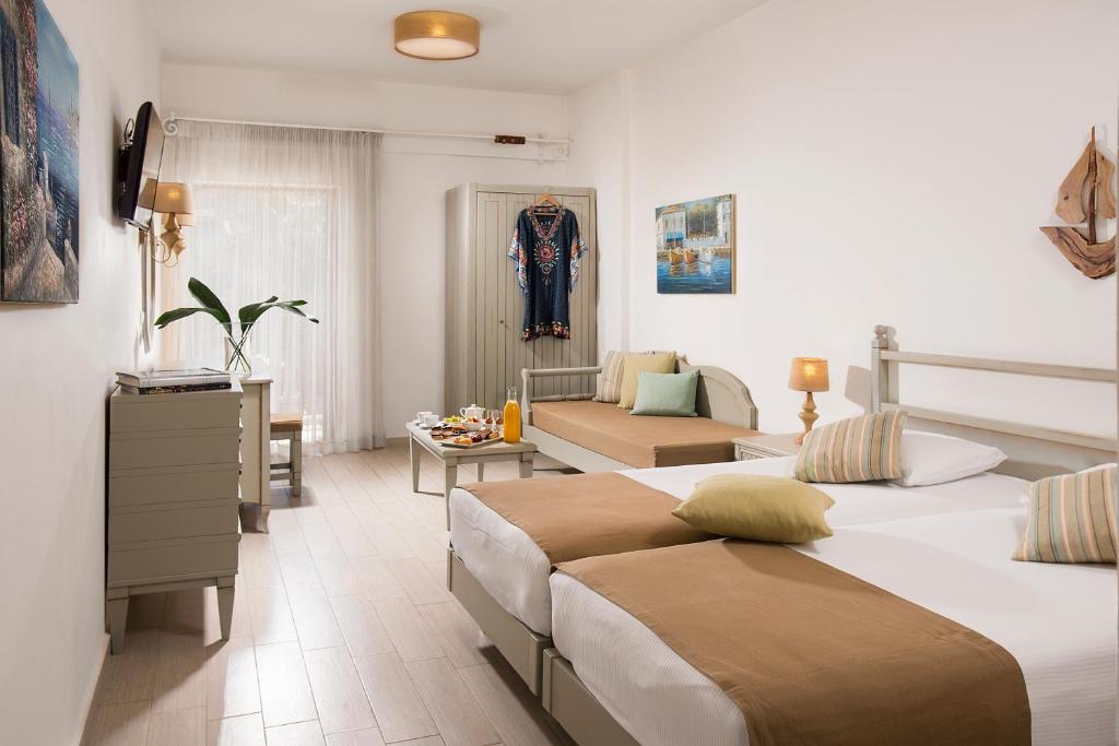 Postel nebo postele na pokoji v ubytování Almyrida Resort