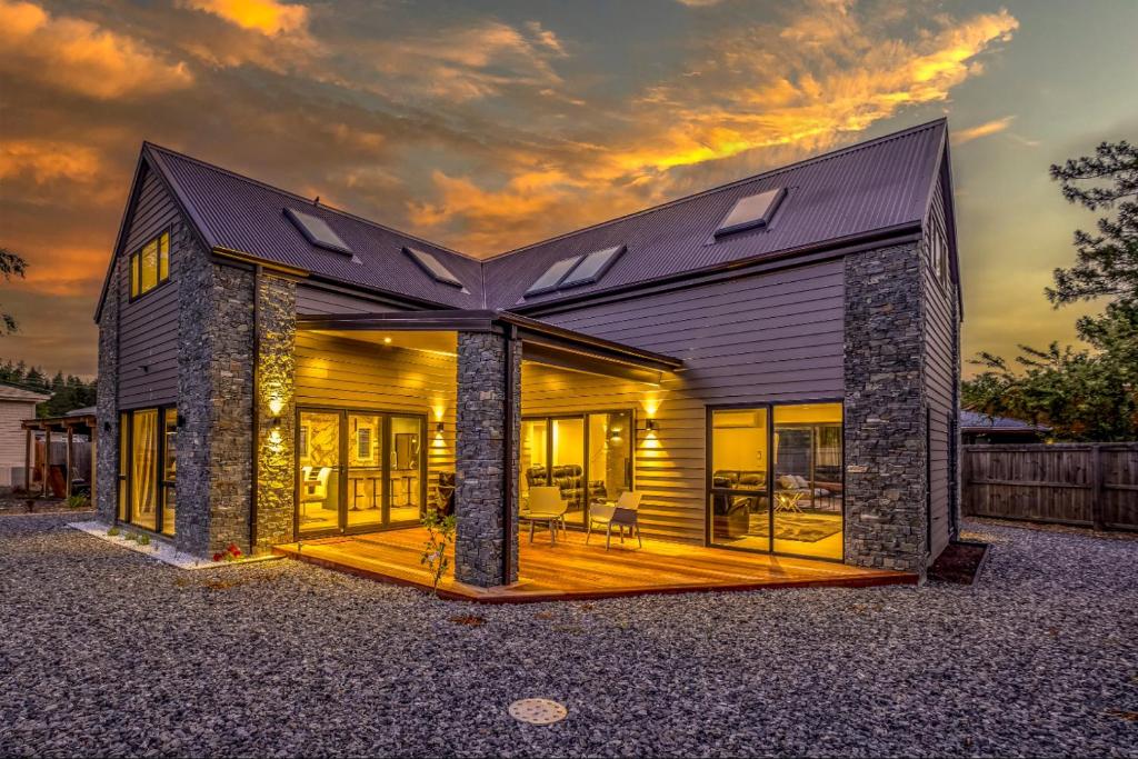 a house with a large group of windows on it at 44b Scarborough Terrace in Hanmer Springs