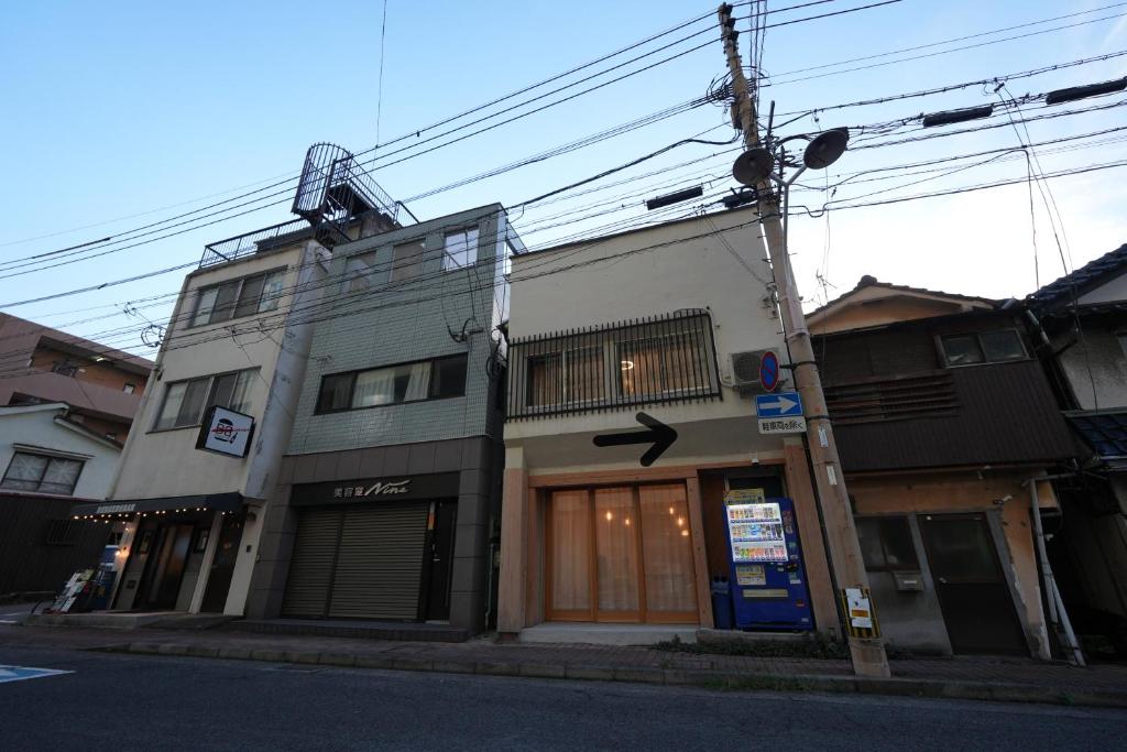 a building on the side of a street at TomaReno Beppu-Kitahama in Beppu