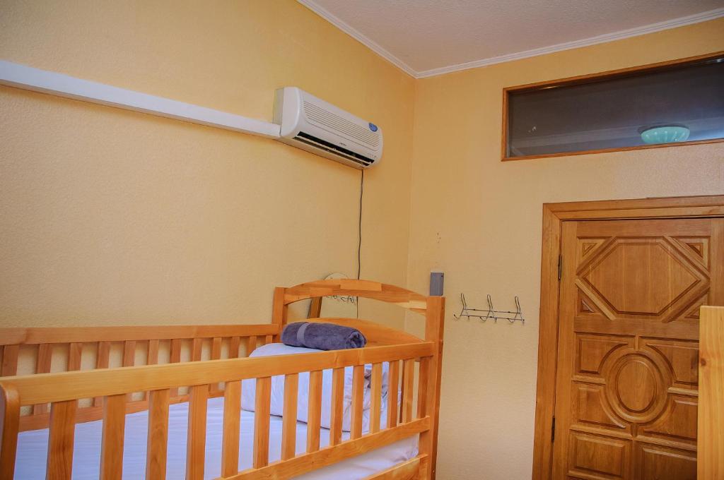 Postel nebo postele na pokoji v ubytování Golden Globus Hostel