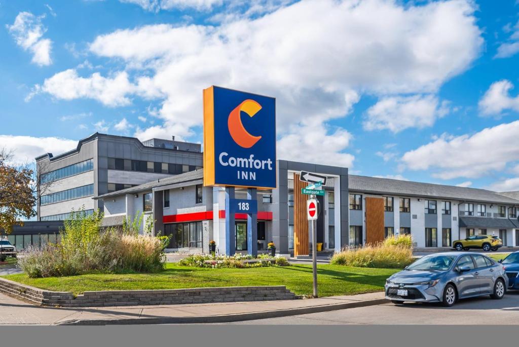 a car parked in front of a car dealership at Comfort Inn Hamilton - Stoney Creek in Hamilton