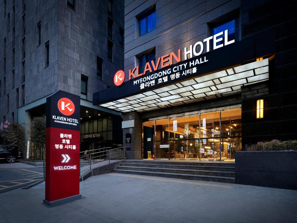 a building with a sign in front of it at Klaven Hotel Myeongdong City Hall in Seoul