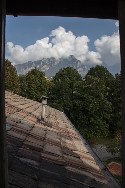 a view from the roof of a house with trees at Villa del Cigno in Lecco