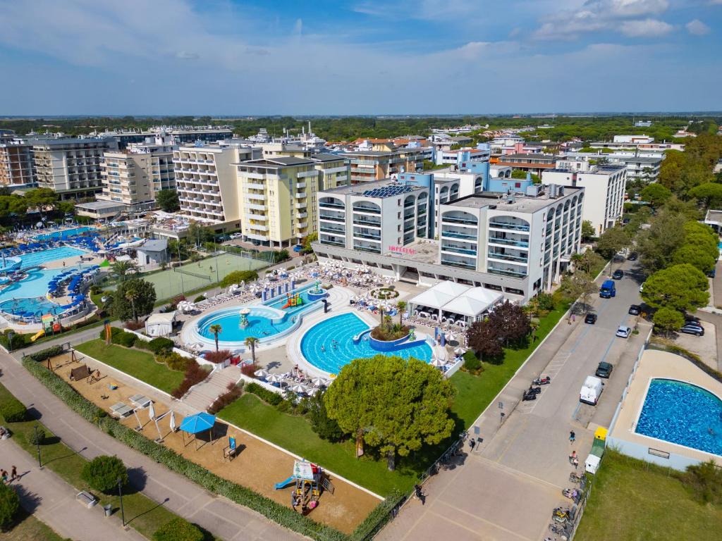 an aerial view of a resort with two pools at Aparthotel Imperial in Bibione