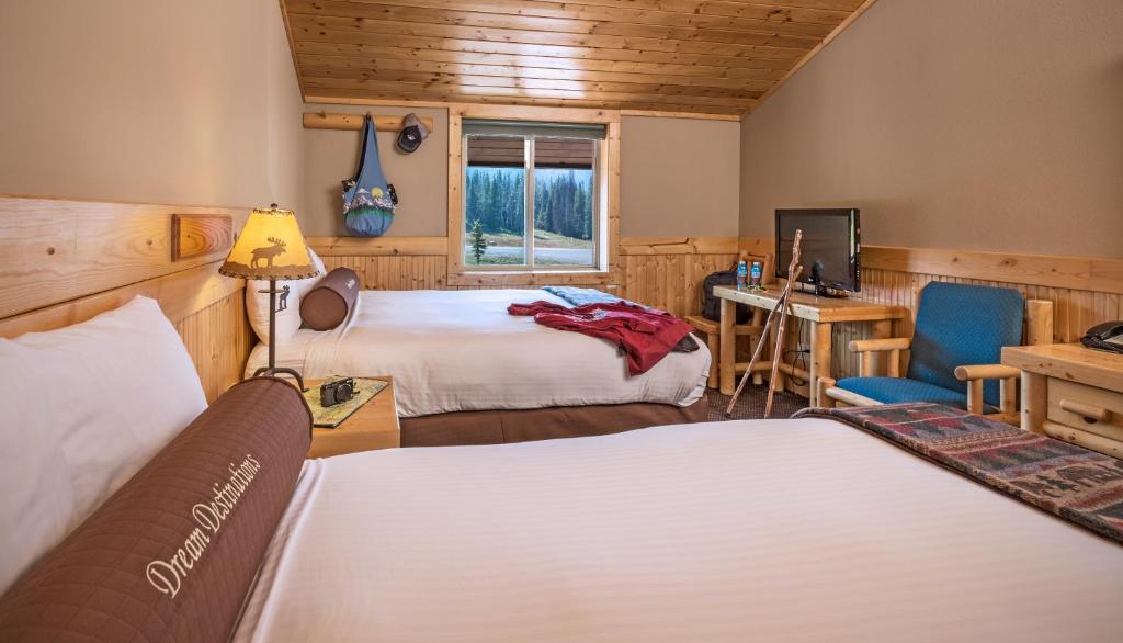 Voodi või voodid majutusasutuse Togwotee Mountain Lodge toas