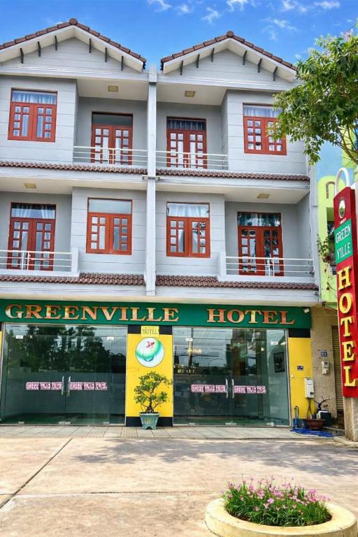 a hotel in front of a building at Green Ville Hotel Đồng Nai in Xa Dau Giay