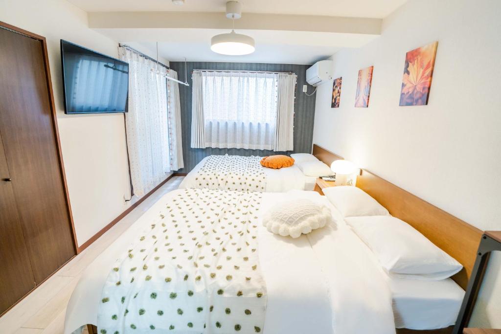 203 Room, a 6-minute walk from Tokyo Koiwa Station Direct connected to Shinjuku and Akihabara Stations Comfortable one-bedroom apartment with separate wet and dry areas