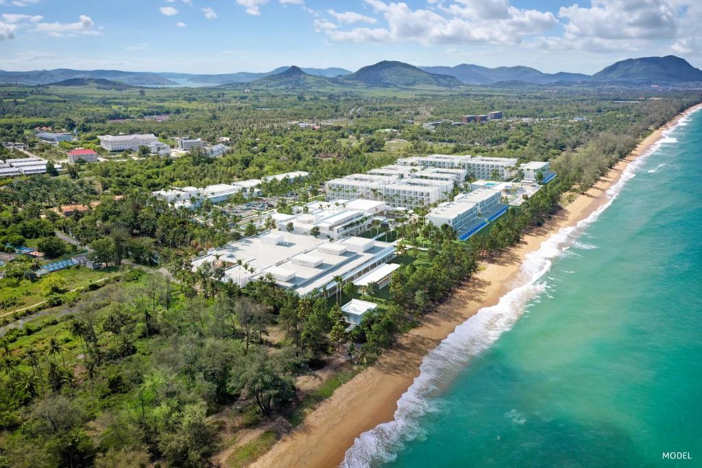 an aerial view of the resort and the beach at Hotel Riu Palace Phuket - All Inclusive in Mai Khao Beach