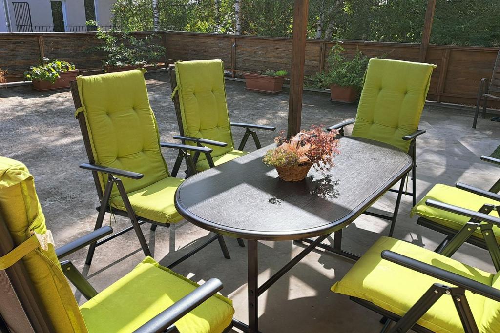 a group of chairs and a table on a patio at Apartment Wurth in Groß-Siegharts
