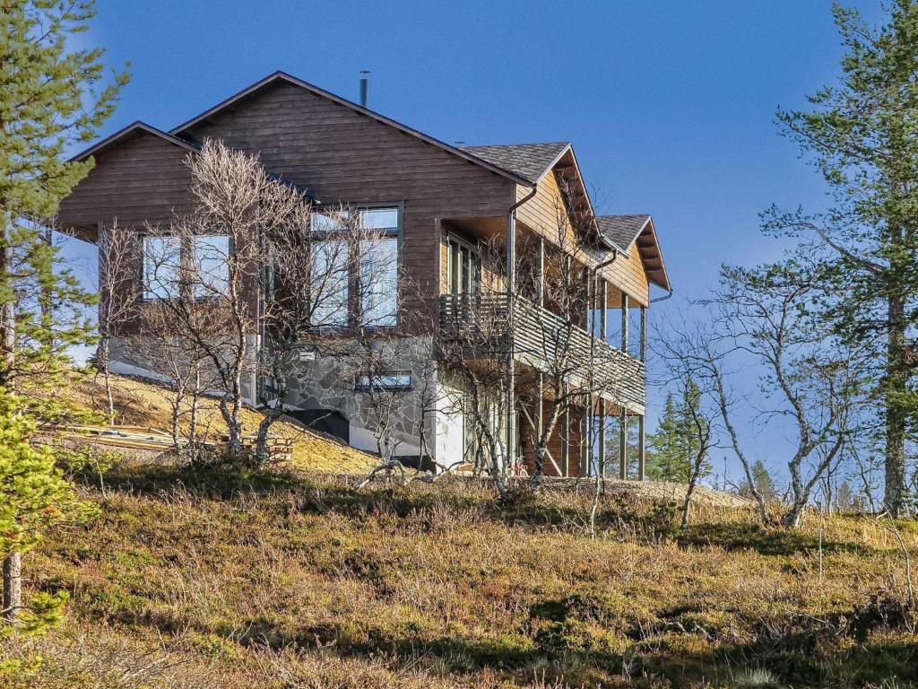 an old house on top of a hill at Holiday Home Karhu b by Interhome in Saariselka