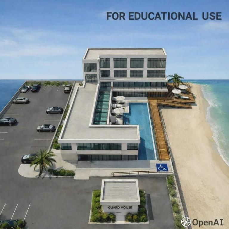 a building with a swimming pool next to a beach at Zamaria Beach Resort & Hotel in Sampong