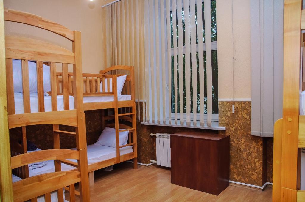 Postel nebo postele na pokoji v ubytování Golden Globus Hostel