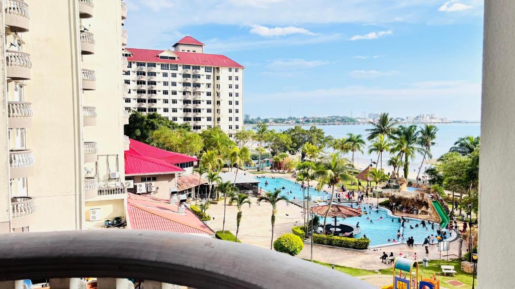 a view of a resort with a swimming pool at Glory Beach Resort By D'Shepherd Management in Port Dickson