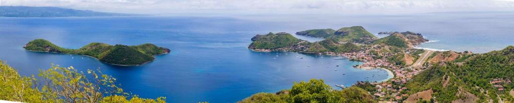 an aerial view of a group of islands in the water at Rock And Roots Experience - Terre de Haut - Les Saintes - Guadeloupe in Terre-de-Haut