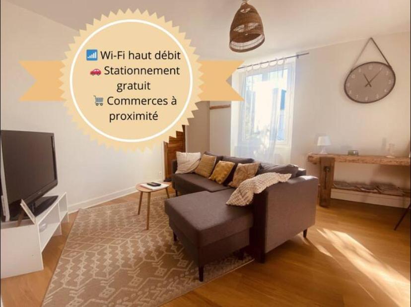 a living room with a couch and a tv at L Oustal Henri-La Primaube-3 chambres in Luc
