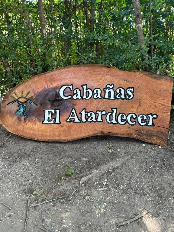 a wooden sign that says calabras el antelope at El Atardecer in Trapiche
