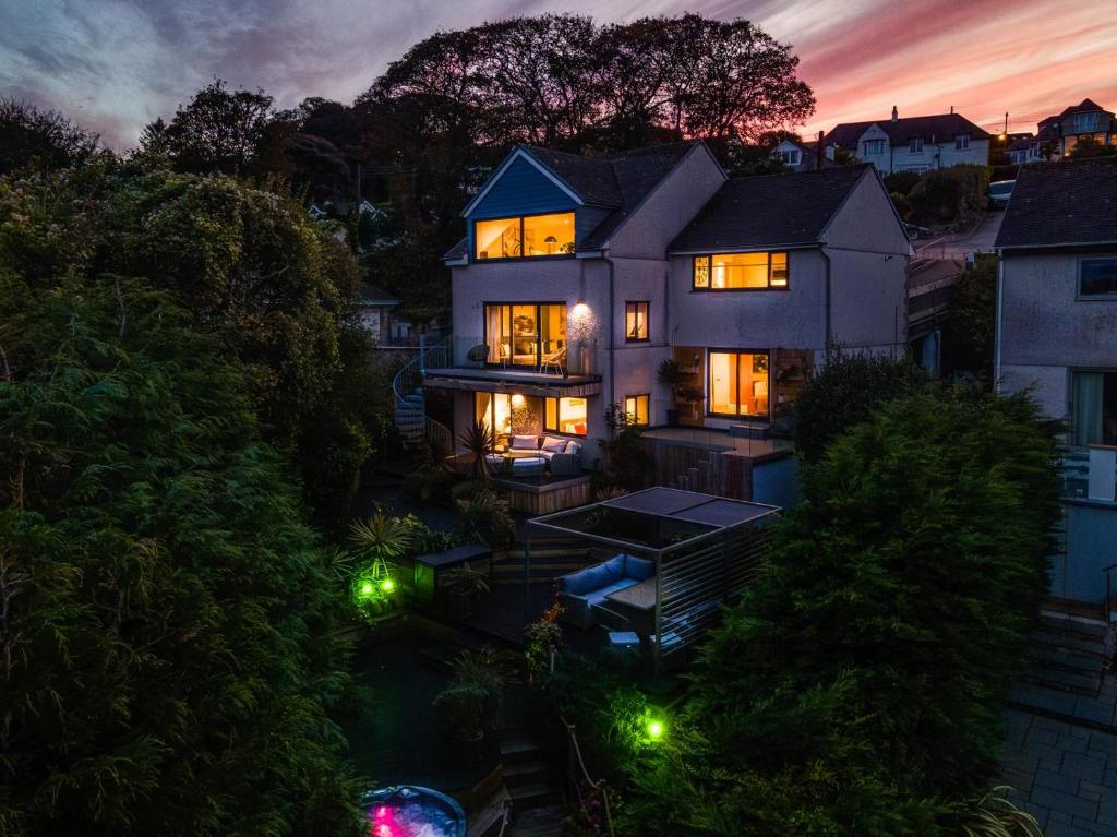 an aerial view of a house with lights at 4 Bed in Carbis Bay oc-m30075 in Carbis Bay