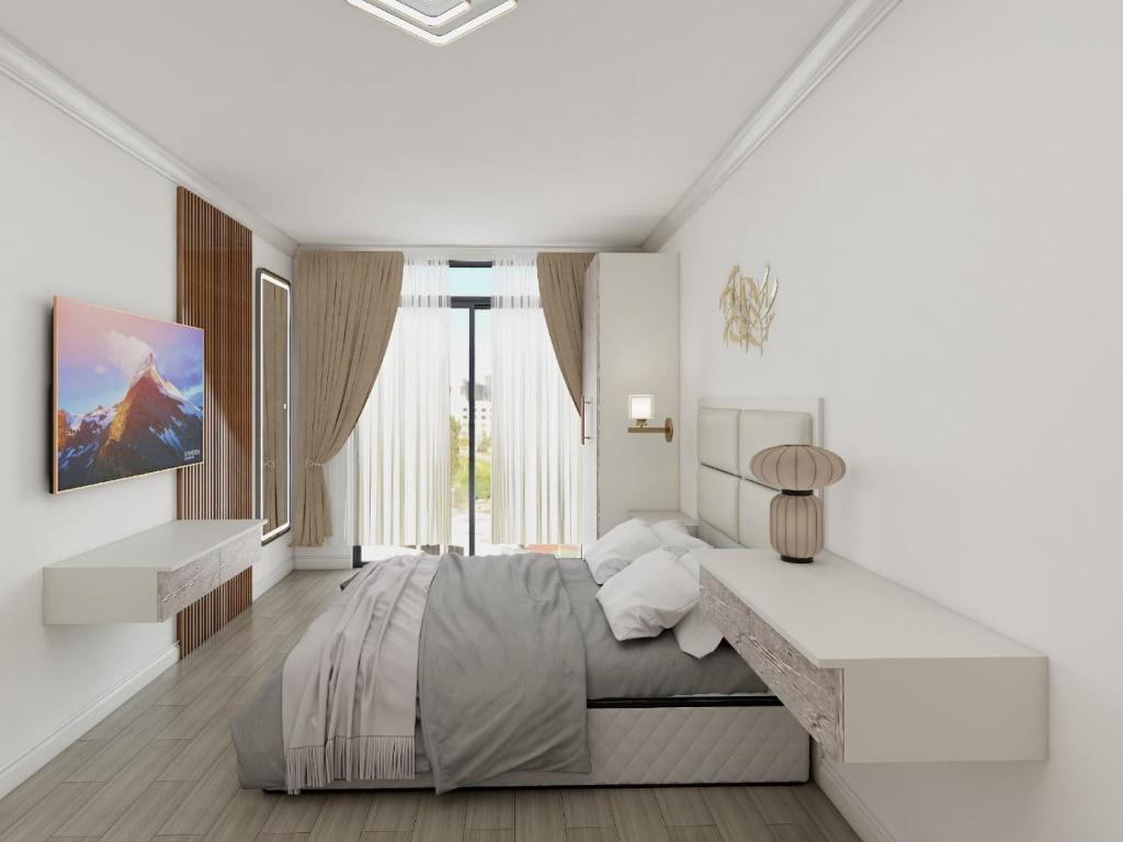 Llit o llits en una habitació de The Ambience