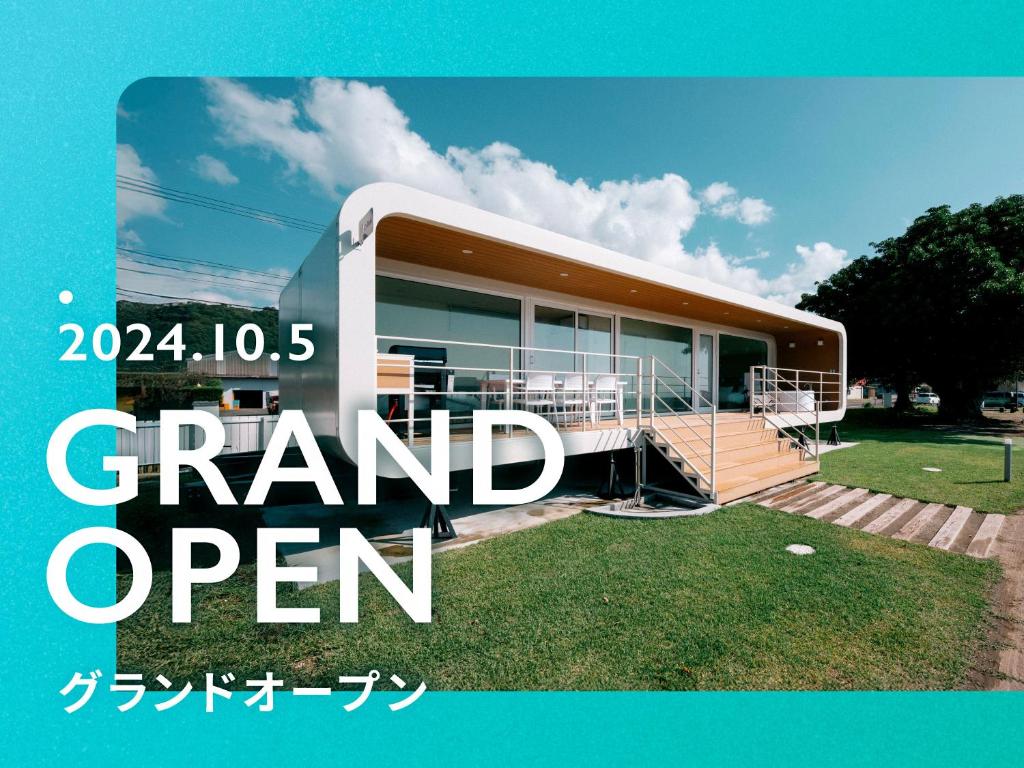 a sign that says grand open in front of a house at Thousand Garden Tarumizu in Tarumizu