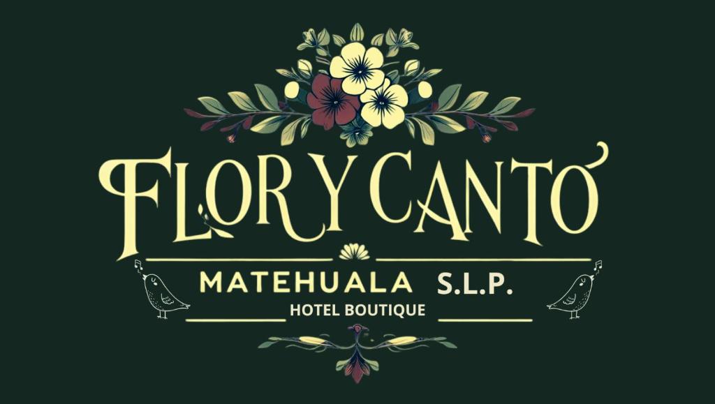 a sign for a moroccan restaurant with areath of flowers at Flor y Canto Hotel in Matehuala