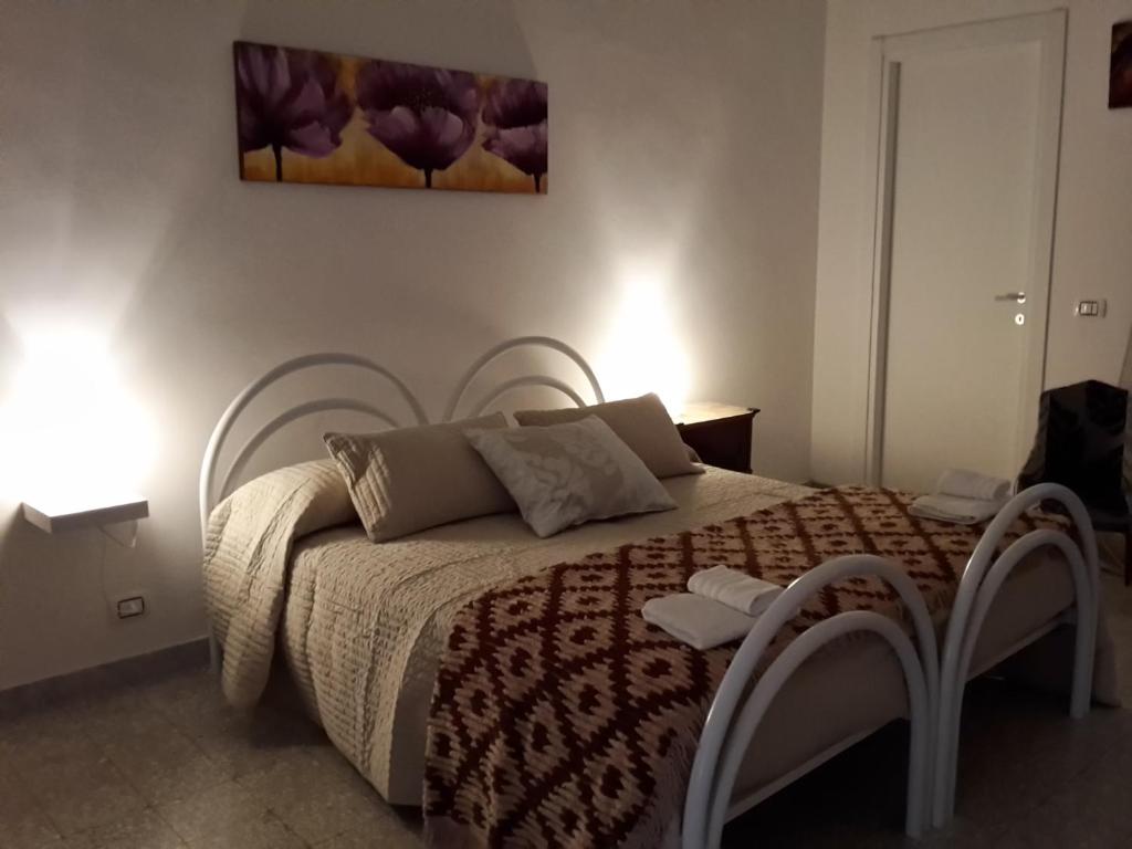 Postel nebo postele na pokoji v ubytování B&B Dimora Lucia e Dalila