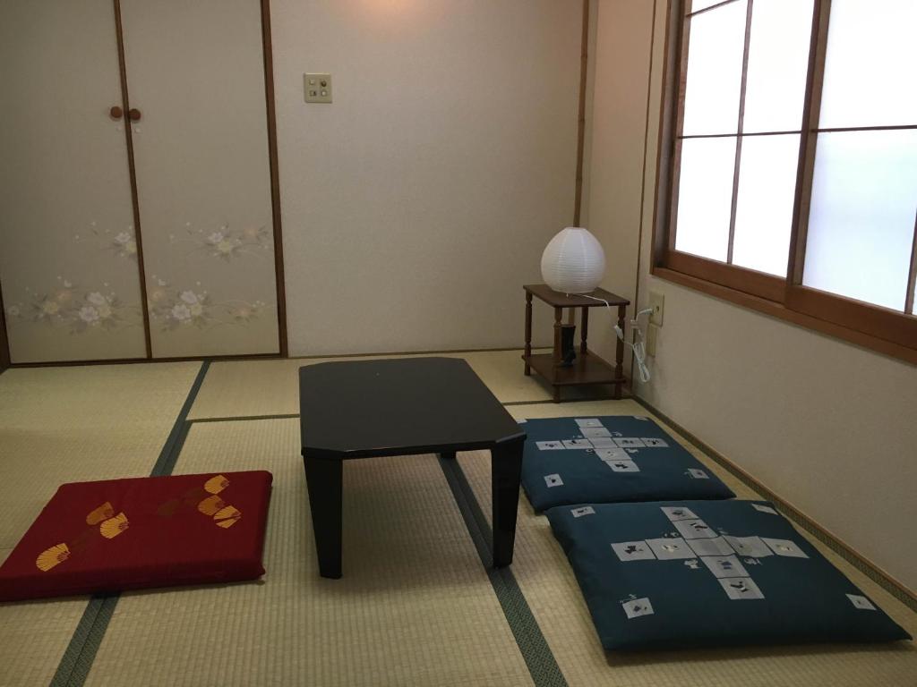Postel nebo postele na pokoji v ubytování Jemsty Inn Hakone Ashinoko