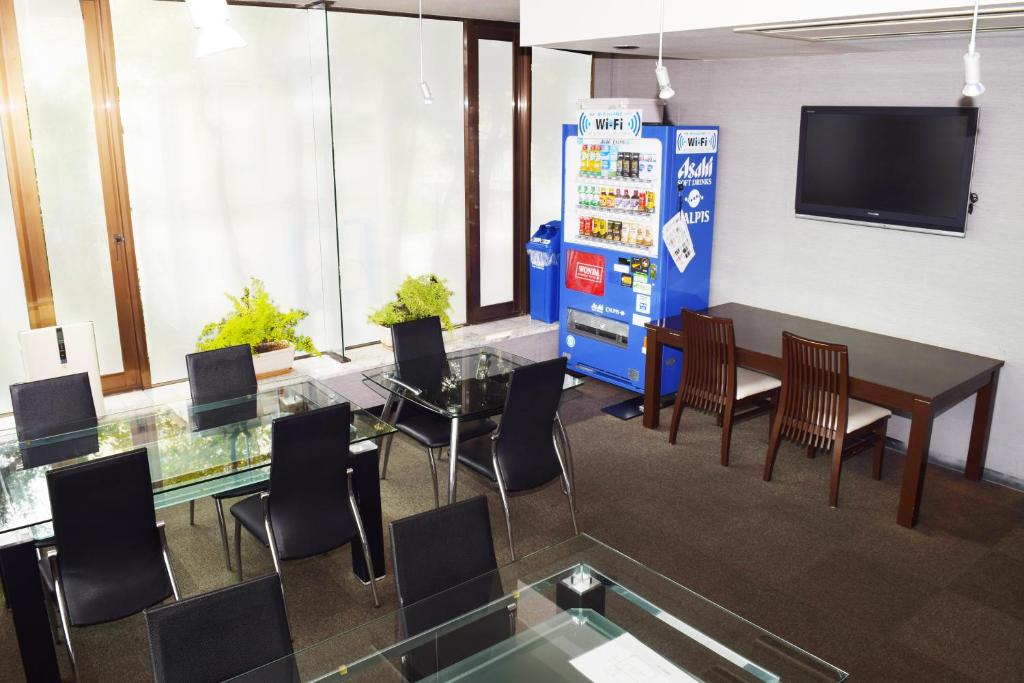 TV a/nebo společenská místnost v ubytování Sakura Hotel Oami
