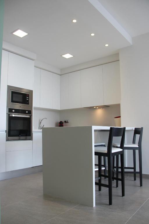 A kitchen or kitchenette at Penthouse Over The Sea