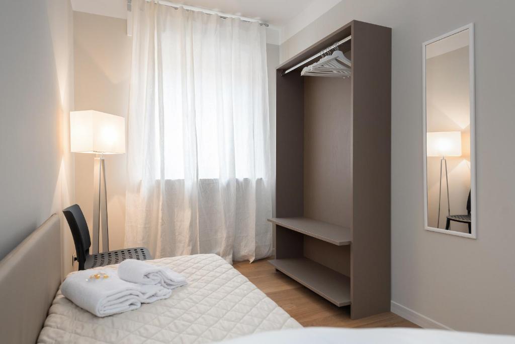 Posteľ alebo postele v izbe v ubytovaní Flats4rent