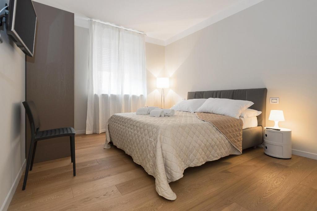 Posteľ alebo postele v izbe v ubytovaní Flats4rent