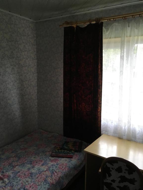 Postel nebo postele na pokoji v ubytování Tolli Hostel & Holiday House