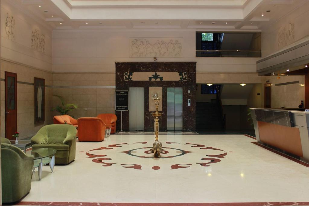 Kuchyň nebo kuchyňský kout v ubytování The Samrat Hotel near Pune Railway Station