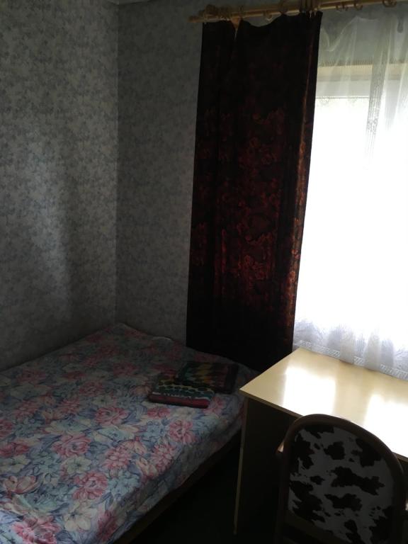 Postel nebo postele na pokoji v ubytování Tolli Hostel & Holiday House