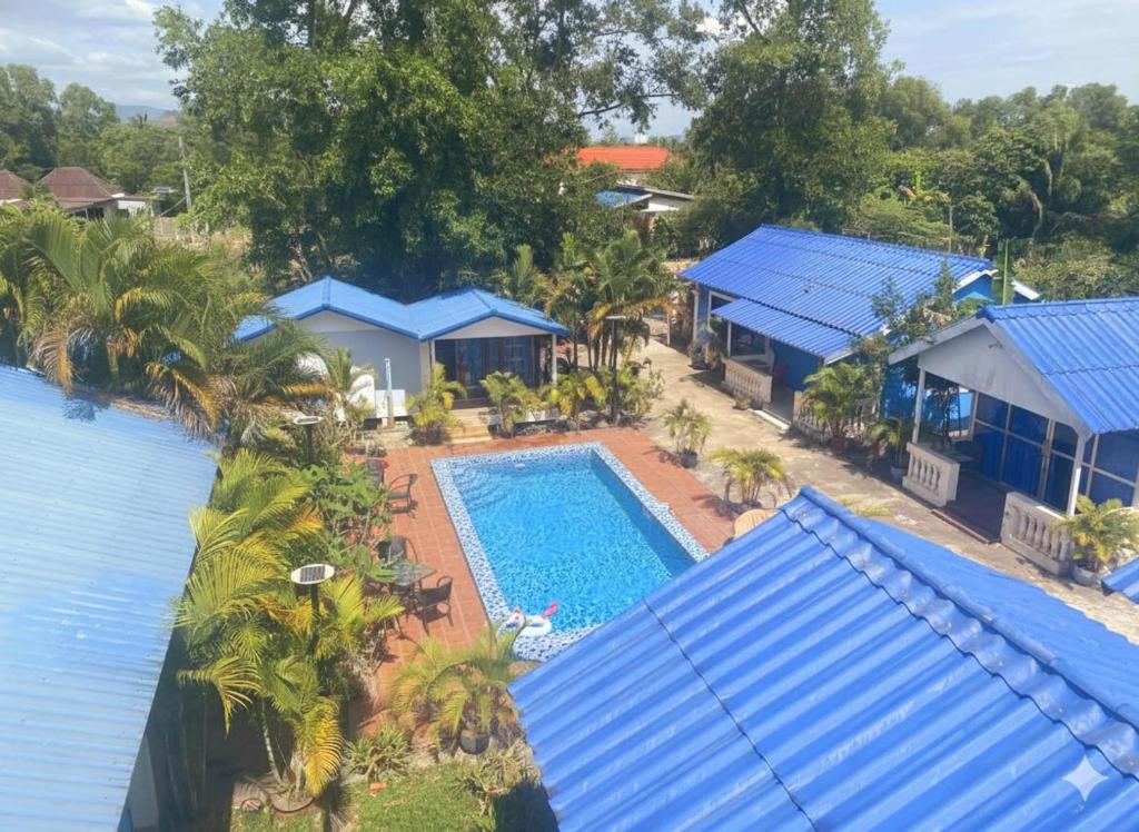an aerial view of a resort with a swimming pool at Orchid bokor family guest house in Kampot