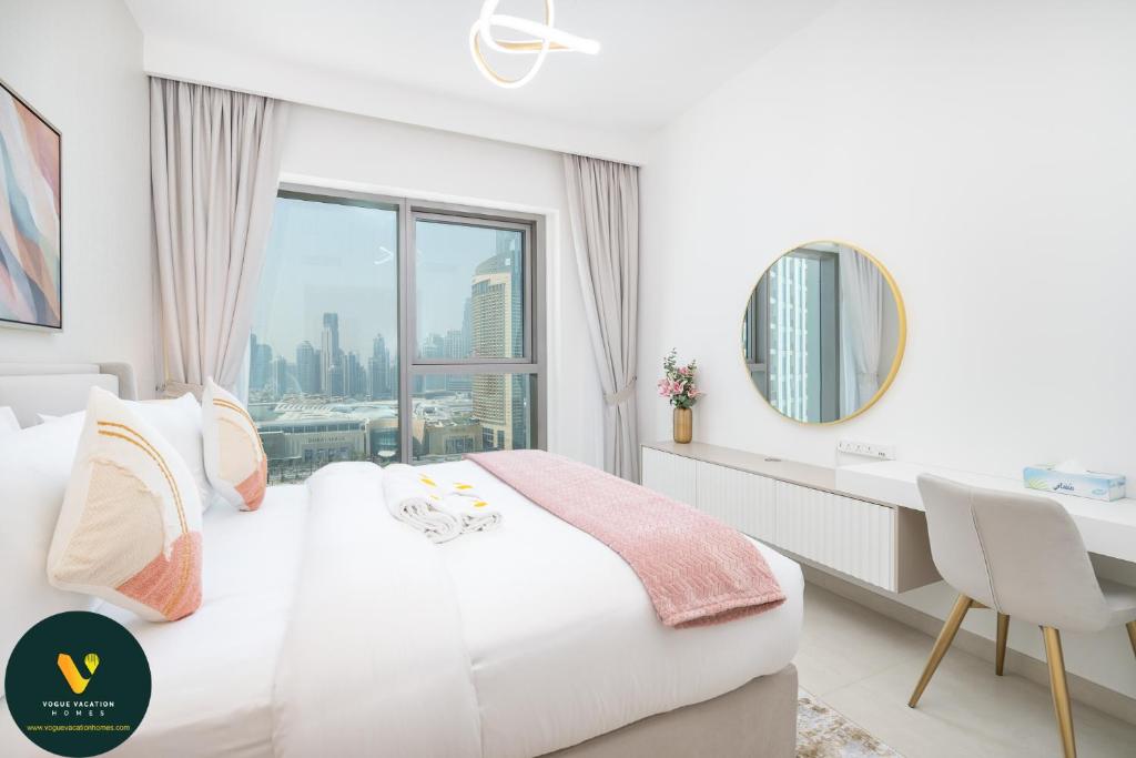 امکانات Vogue Vacation Homes, Downtown Views II with Easy Access to Dubai Mall Via a Climate Controlled Bridge, Two Bedroom Apartment with Balcony and Burj Khalifa View - تصویر ۴