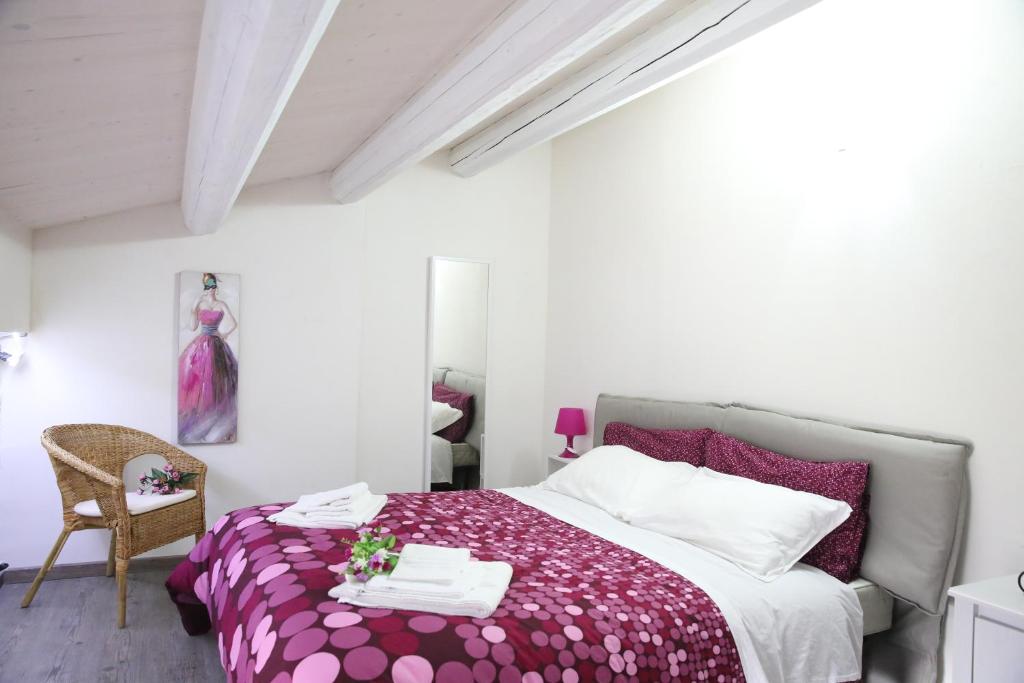 Łóżko lub łóżka w pokoju w obiekcie Villa Antica Aia Relax