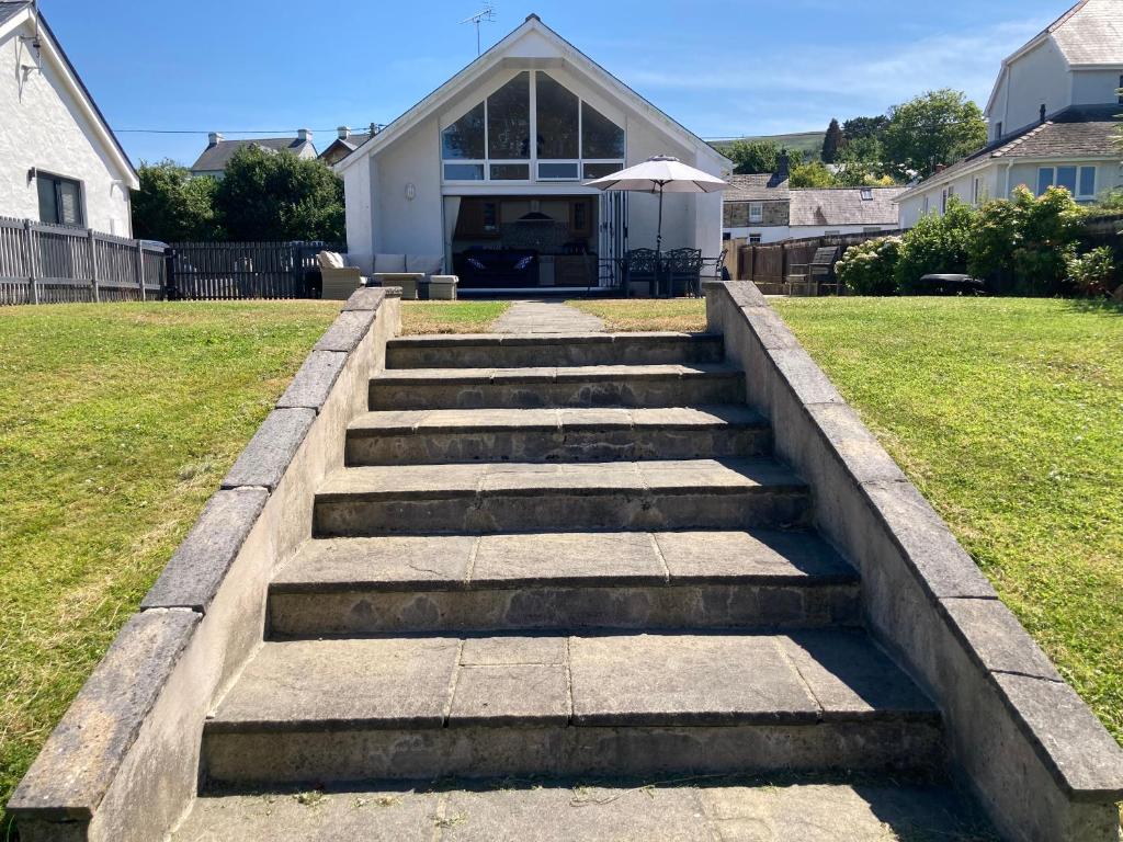 a set of concrete steps leading to a house at Awel Deg in Pembrokeshire