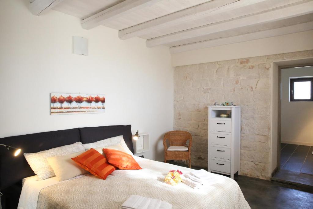 Łóżko lub łóżka w pokoju w obiekcie Villa Antica Aia Relax
