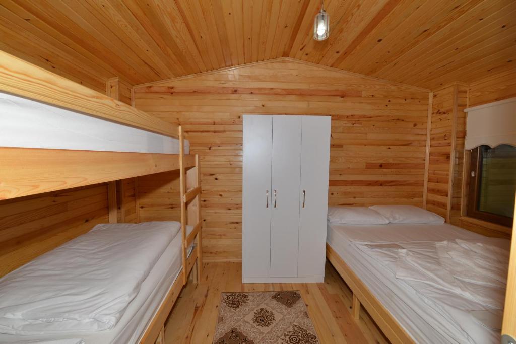 Кровать или кровати в номере Hamsiköy Seyirtepe Butik Otel