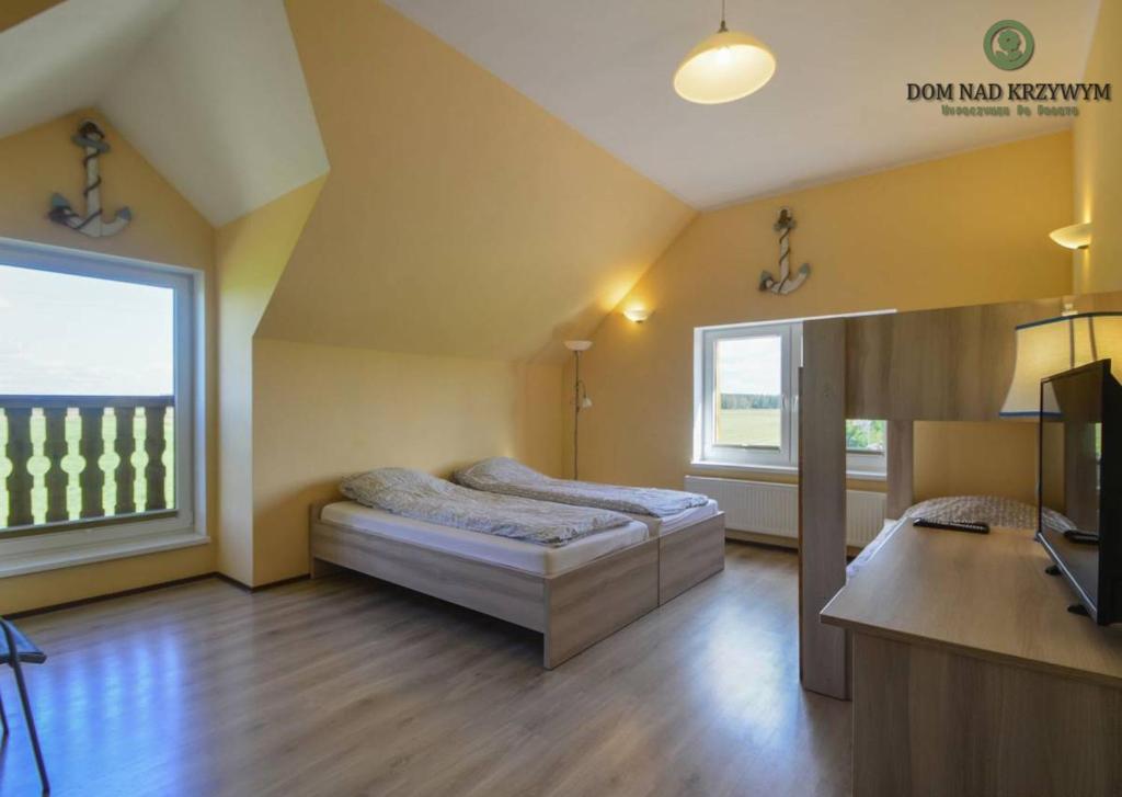 Dom nad Krzywym - prywatna plaża, 2 boiska, sauna, plac zabaw - Habitación Cuádruple Con Baño