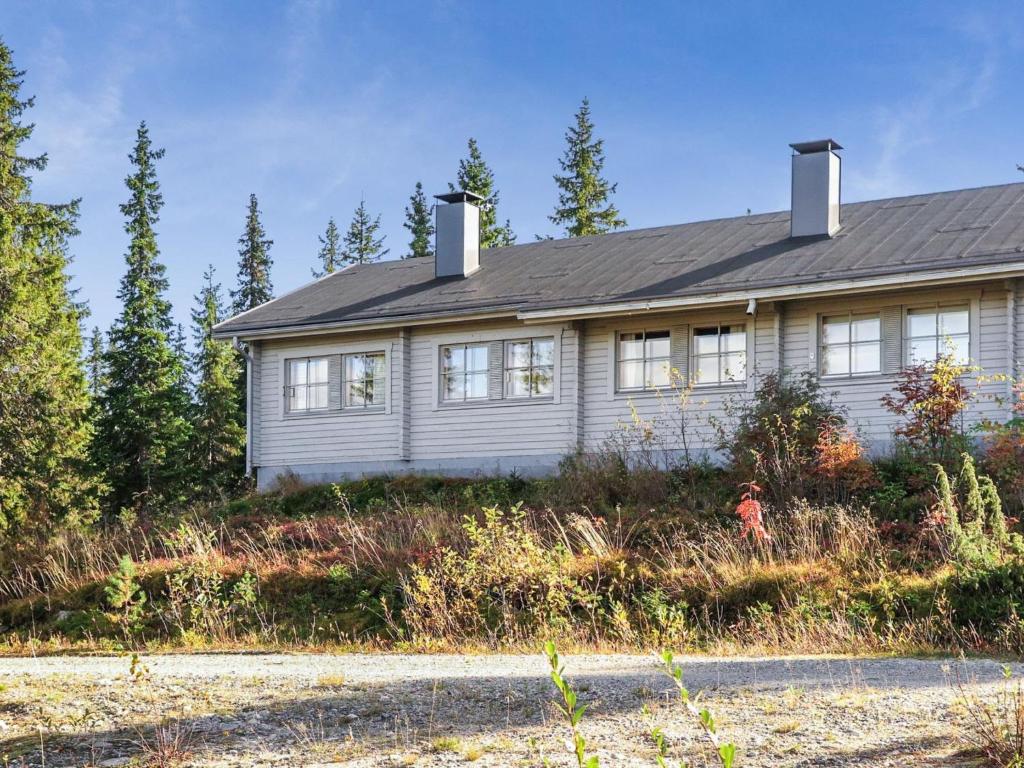 a house sitting on the side of a road at Holiday Home Lupposyöte b1 by Interhome in Syöte