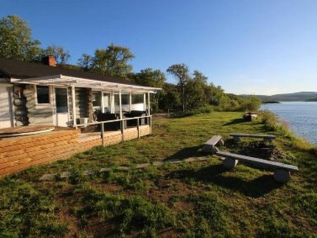 a house on the side of a river with at Holiday Home Karetörmä by Interhome in Nuorgam