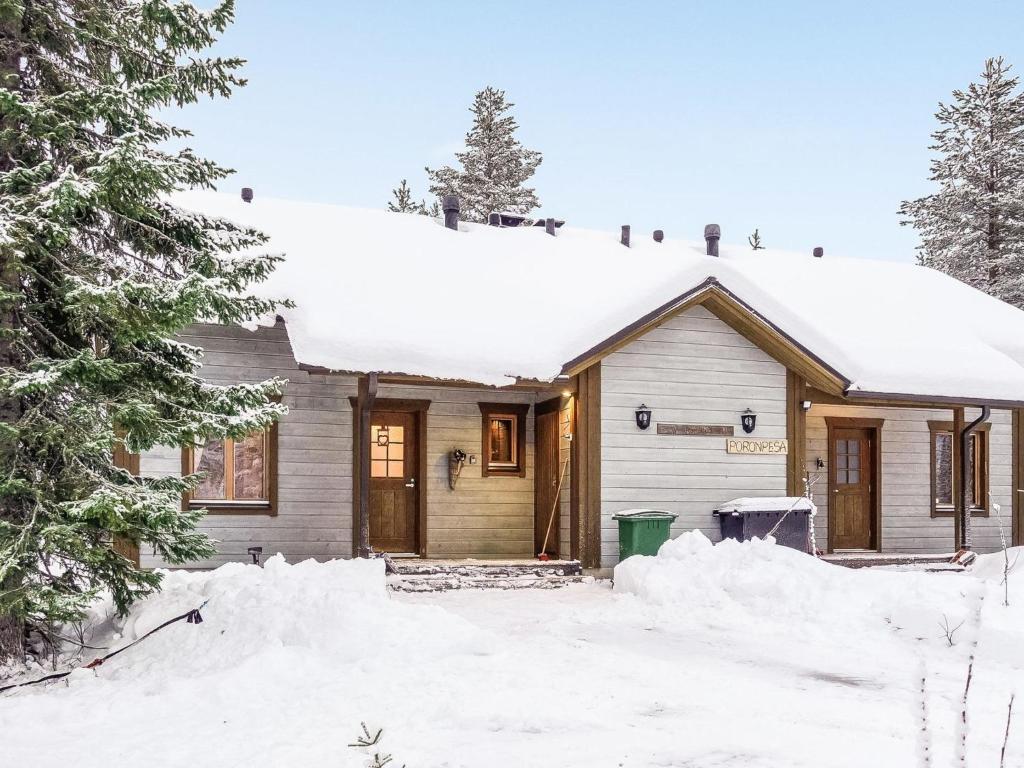 a house with snow on the roof at Holiday Home Rome 10 by Interhome in Syöte