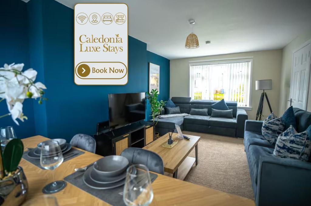 a living room with a couch and a table at Richard Gardens in Bathgate