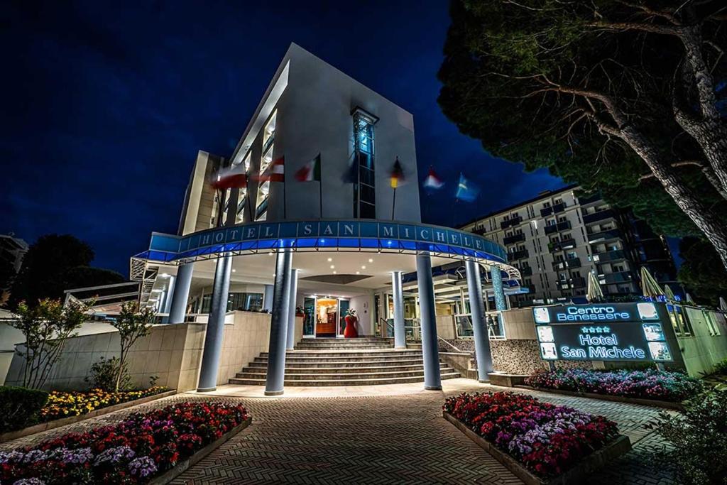 a building with a gazebo in front of it at Hotel San Michele in Bibione