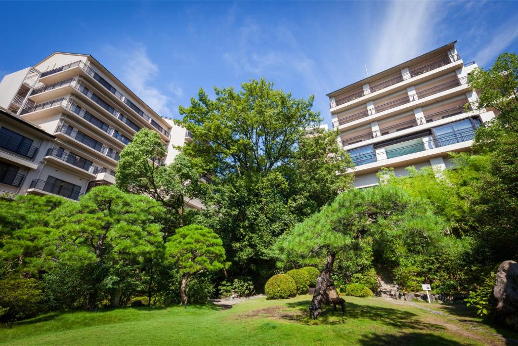 a park in front of an apartment building at Funaya in Matsuyama